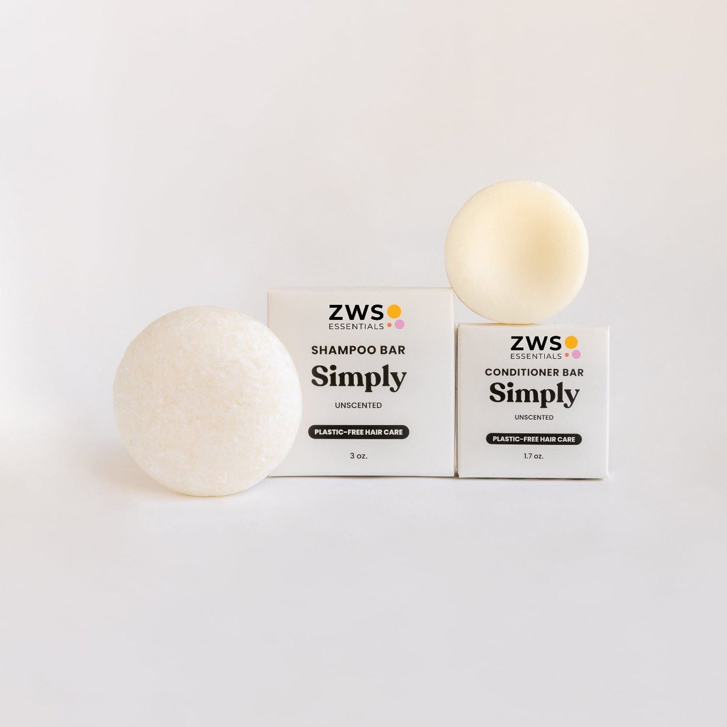 ZeroWasteStore.com shampoo and conditioner bar duo set with unscented, eco-friendly hair care products on a white background.
