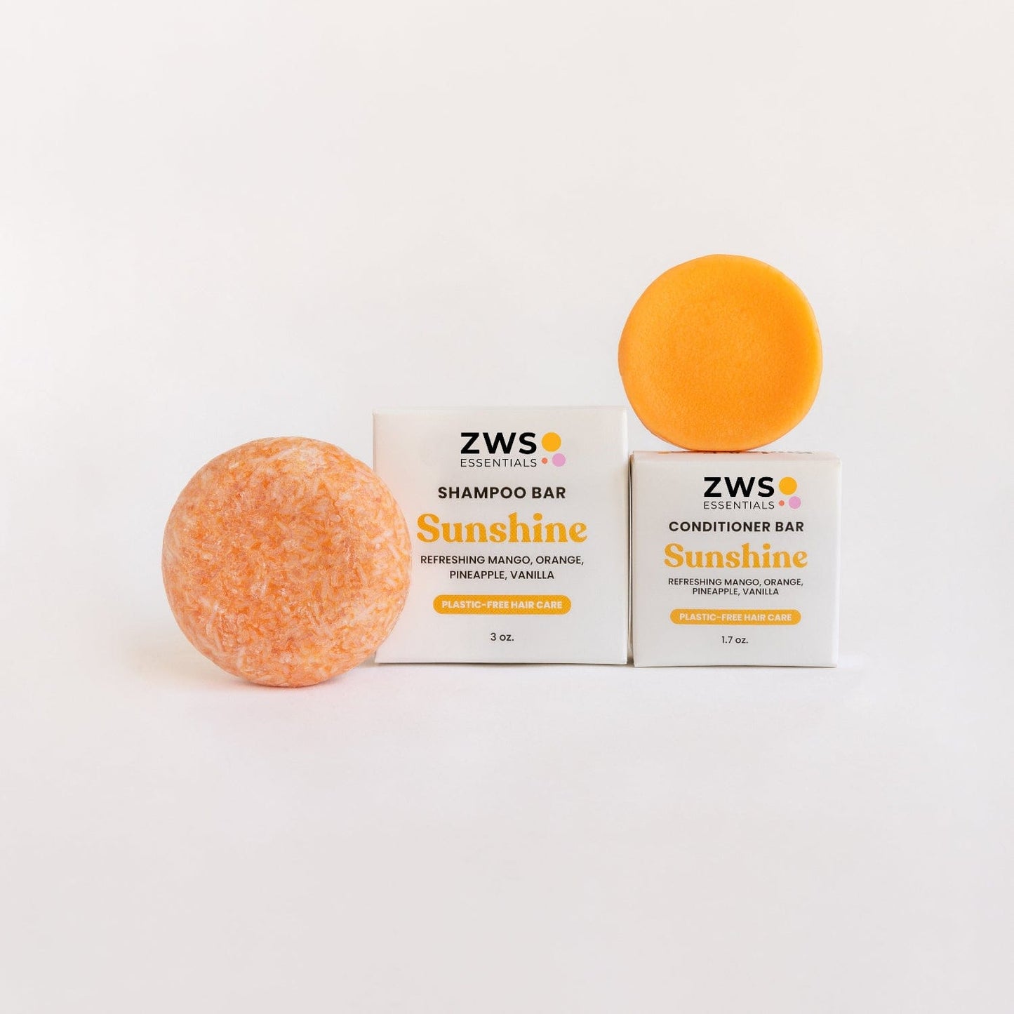 ZeroWasteStore.com shampoo and conditioner bar duo with sunshine scent, eco-friendly hair care set in natural packaging.