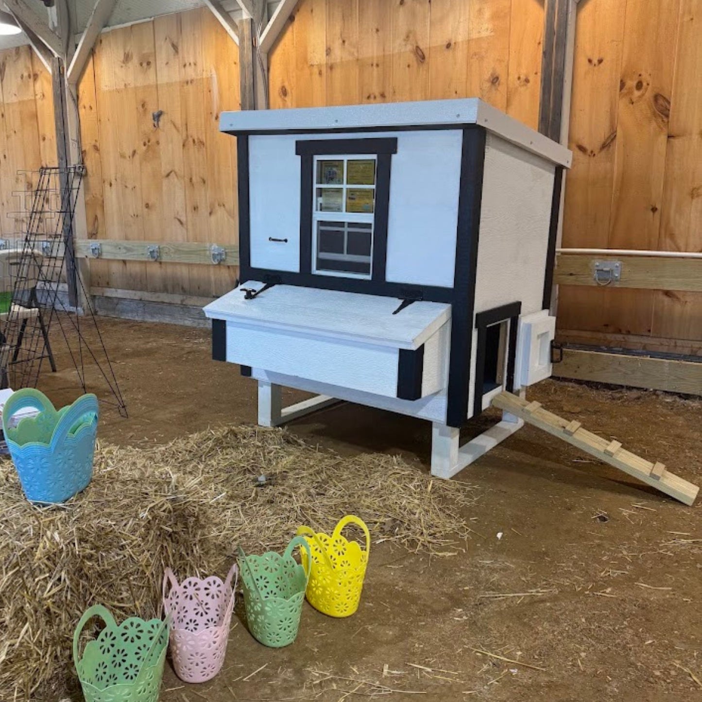 Medium OverEZ Chicken Coop for up to 10 chickens, featuring a sturdy wooden structure and secure nesting areas.