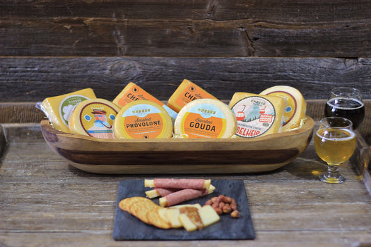 Smoked Favorites Pack featuring 8 cheeses from Cheese Brothers, Inc., showcasing a variety of smoked cheese selections.