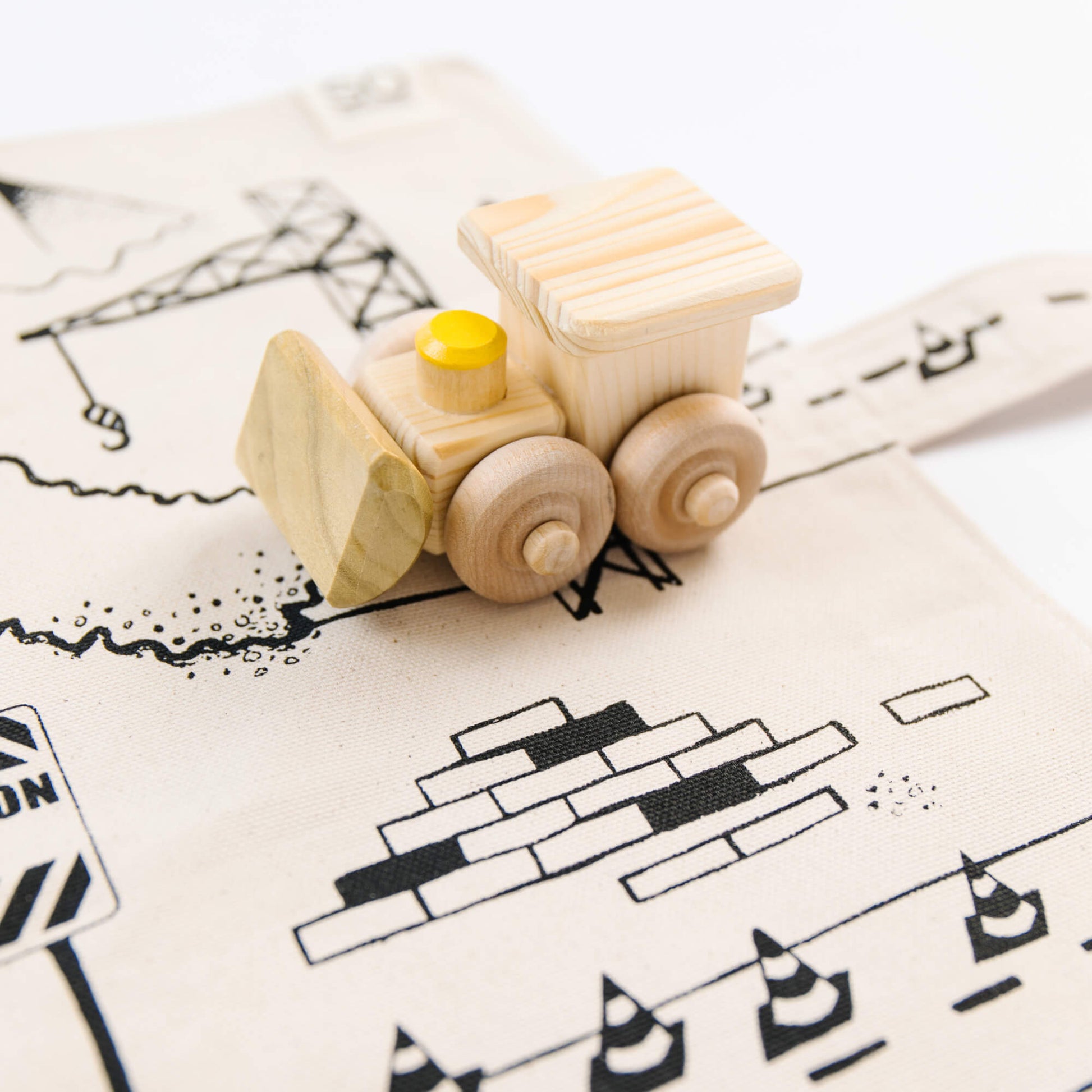 Colorful construction playmat by So Handmade Shop featuring construction vehicles, perfect for little builders and imaginative play.