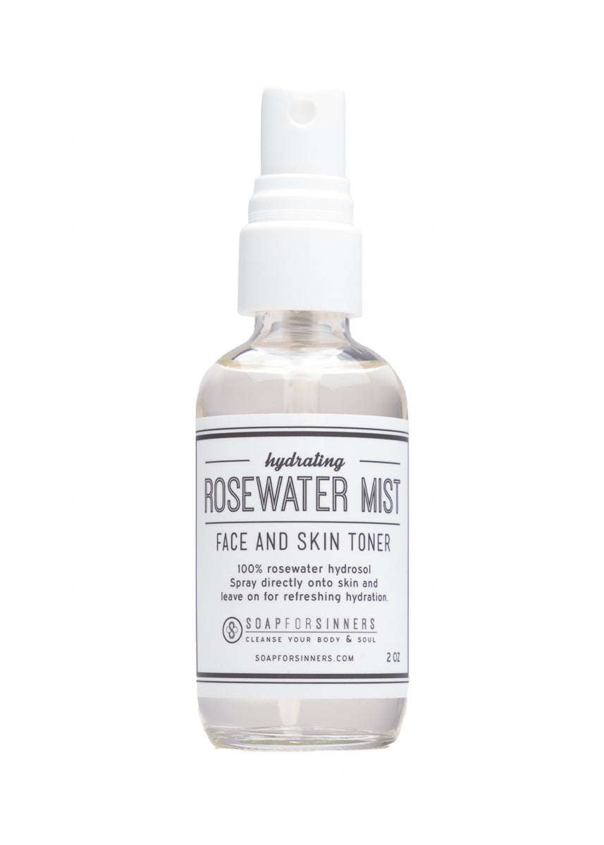 2oz Rosewater Mist hydrosol by Soap for Sinners, featuring a clear spray bottle with a rosewater-infused facial mist.