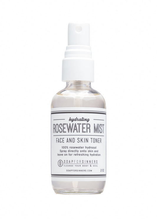 2oz Rosewater Mist hydrosol by Soap for Sinners, featuring a clear spray bottle with a rosewater-infused facial mist.