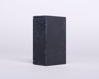 Soap for Sinners bamboo charcoal with cedarwood soap bar showing textured surface and natural ingredients.