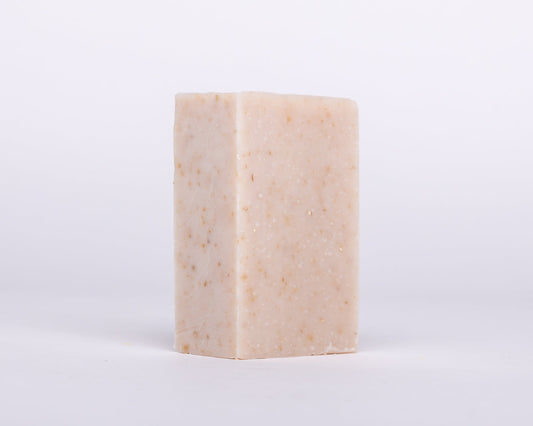 Bar of Soap for Sinners oatmeal and honey soap with a creamy texture and natural ingredients, displayed on a neutral background.