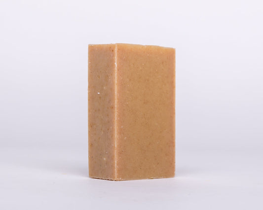 Bar of Soap for Sinners Patchouli Orange with Turmeric soap showing the textured surface and natural ingredients.