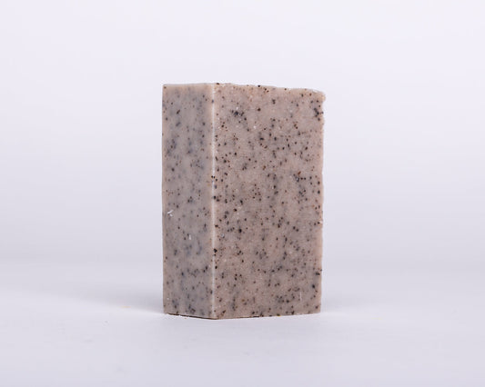 Bar of Soap for Sinners Peppermint Coffee Scrub soap with green and brown swirls, showing a fresh, invigorating scent.