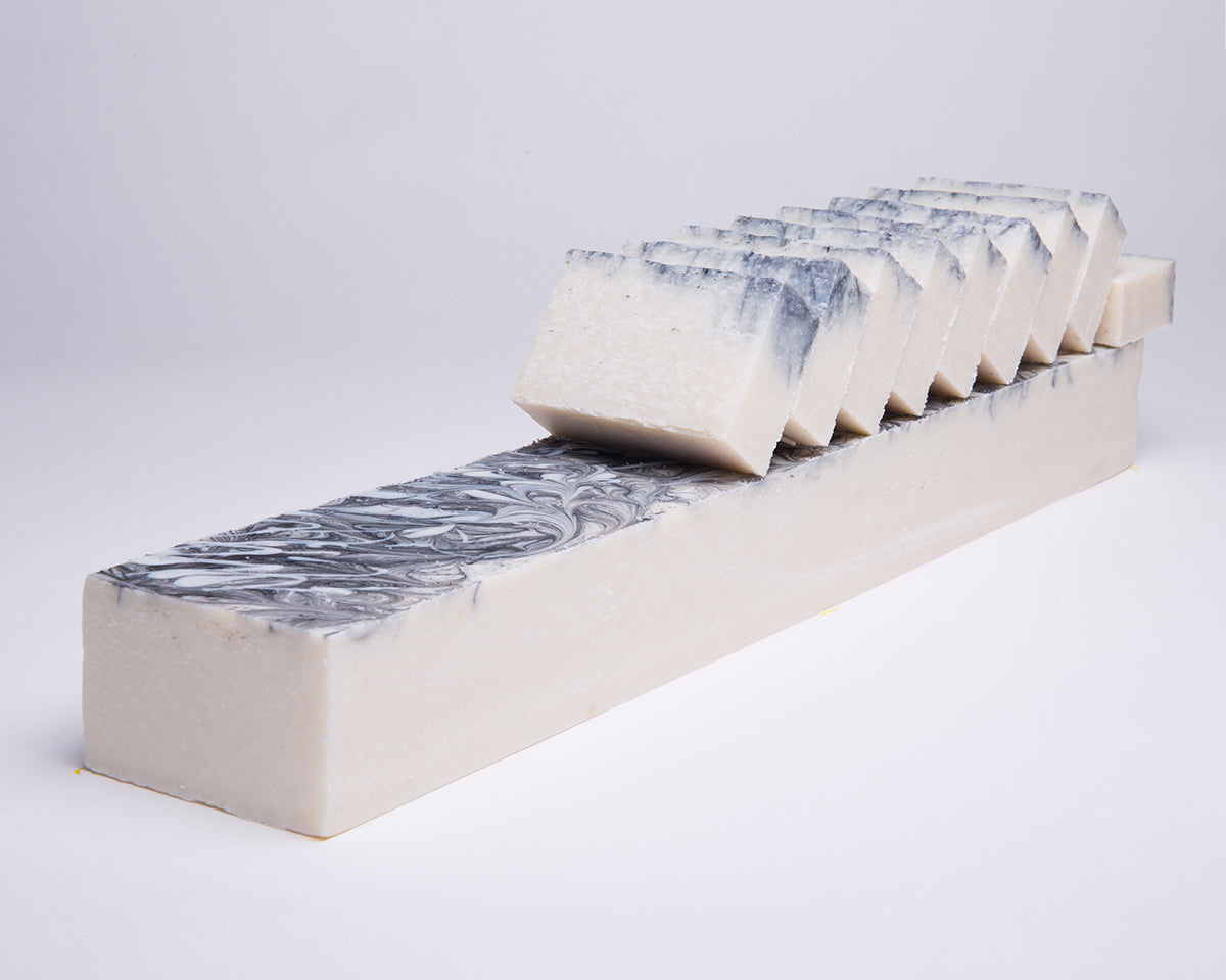 Soap for Sinners pumice microdermabrasion soap bar showing textured surface for exfoliation and skin renewal.