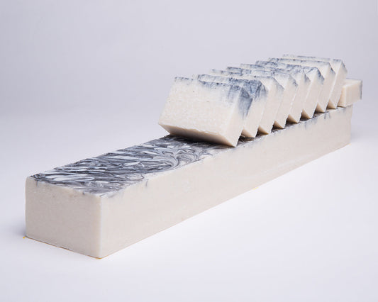Bar of Soap for Sinners Pumice Microdermabrasian soap showing textured pumice surface and smooth soap bar.