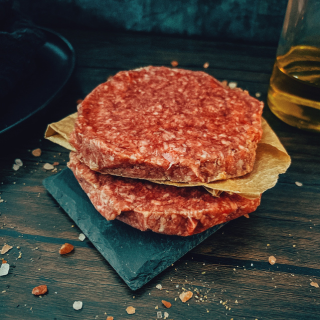 Square burger image featuring FOF The Five Oaks Griller's Box from Five Oaks Farm Wagyu, showcasing premium wagyu beef ready for grilling.