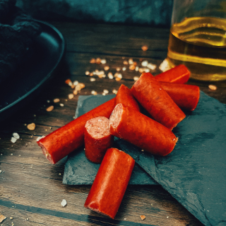 Five Oaks Farm Wagyu griller's box with snack sticks, featuring premium Wagyu beef snack sticks in a square packaging.