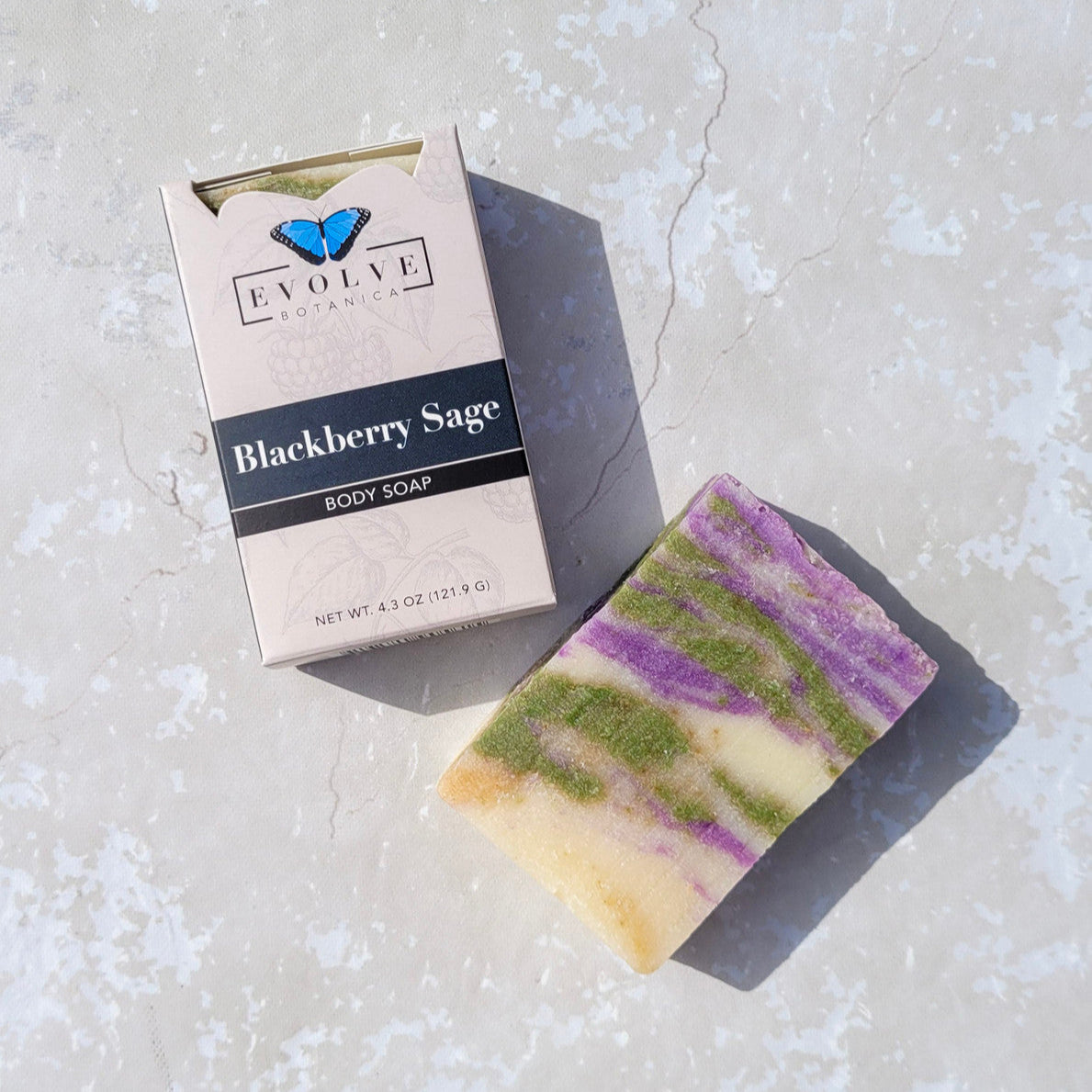 Evolve Botanica Blackberry Sage standard soap bar with natural ingredients, showcasing a dark soap with herbal and berry accents.