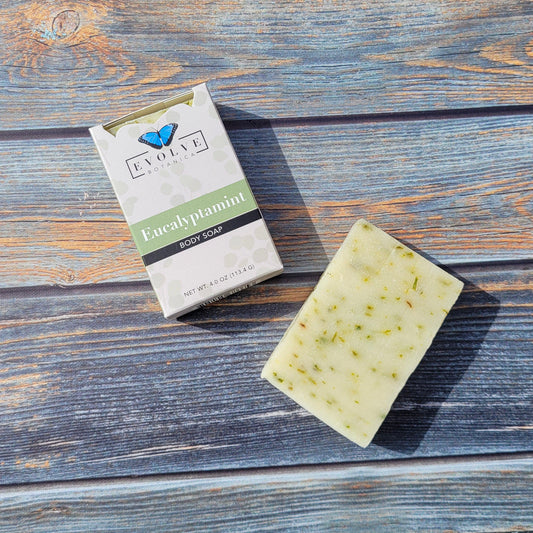 Evolve Botanica Eucalyptamint standard soap bar with green and white packaging, showcasing a fresh, natural soap product.