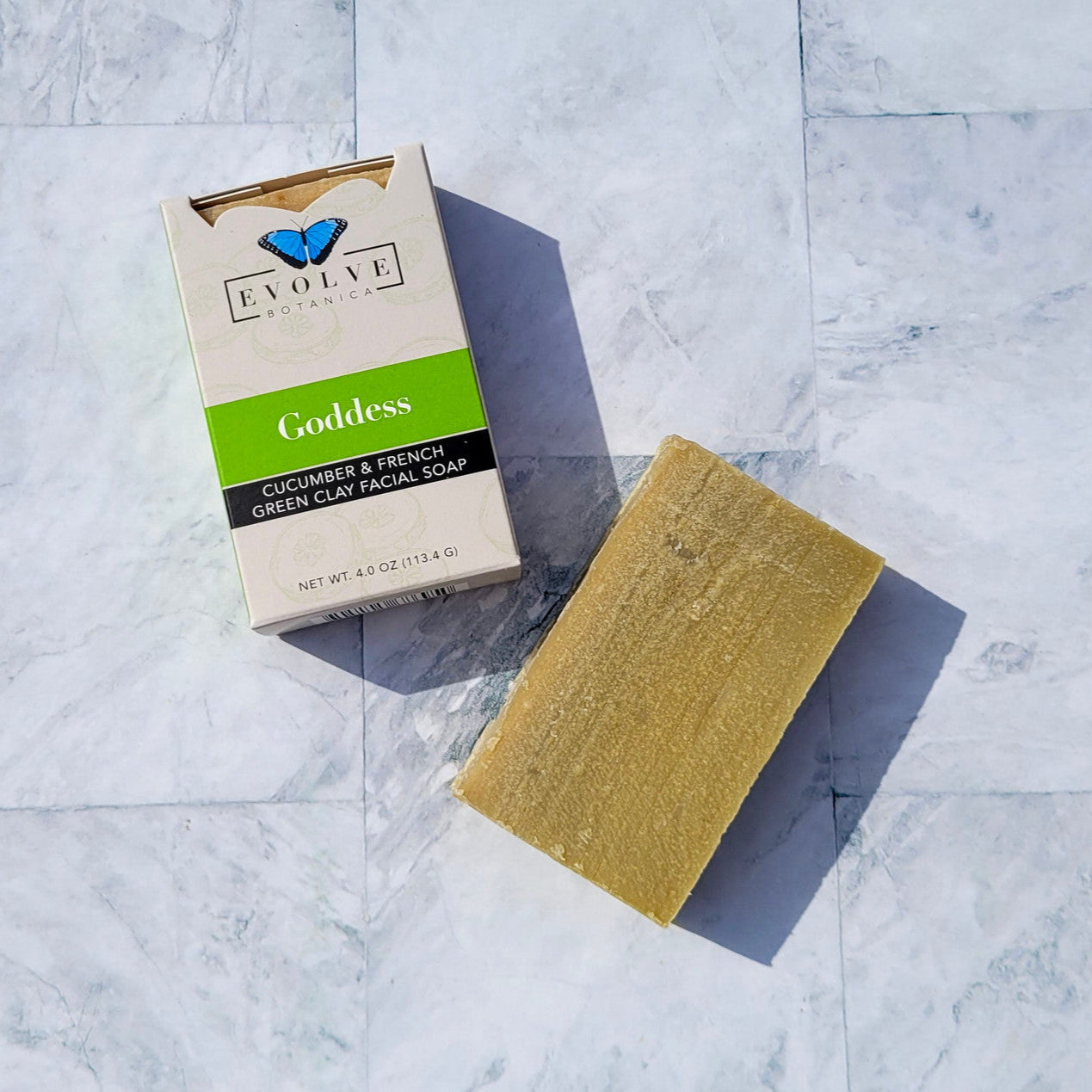 Evolve Botanica Goddess Cucumber & French Green Clay facial soap bar with natural ingredients and soothing green clay appearance.