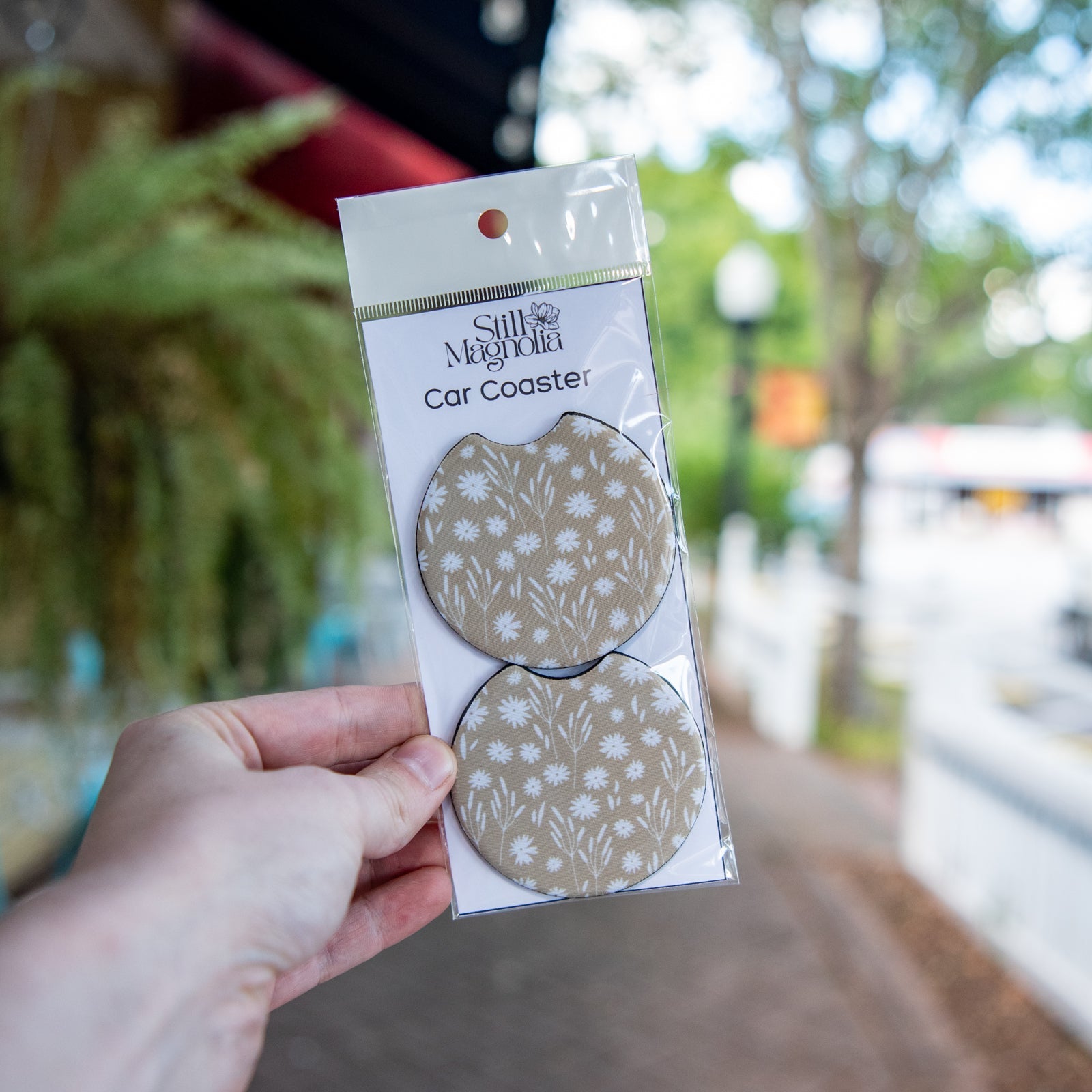 Still Magnolia car coaster with Daisy Daydream pattern featuring colorful floral design for vehicle cup holders
