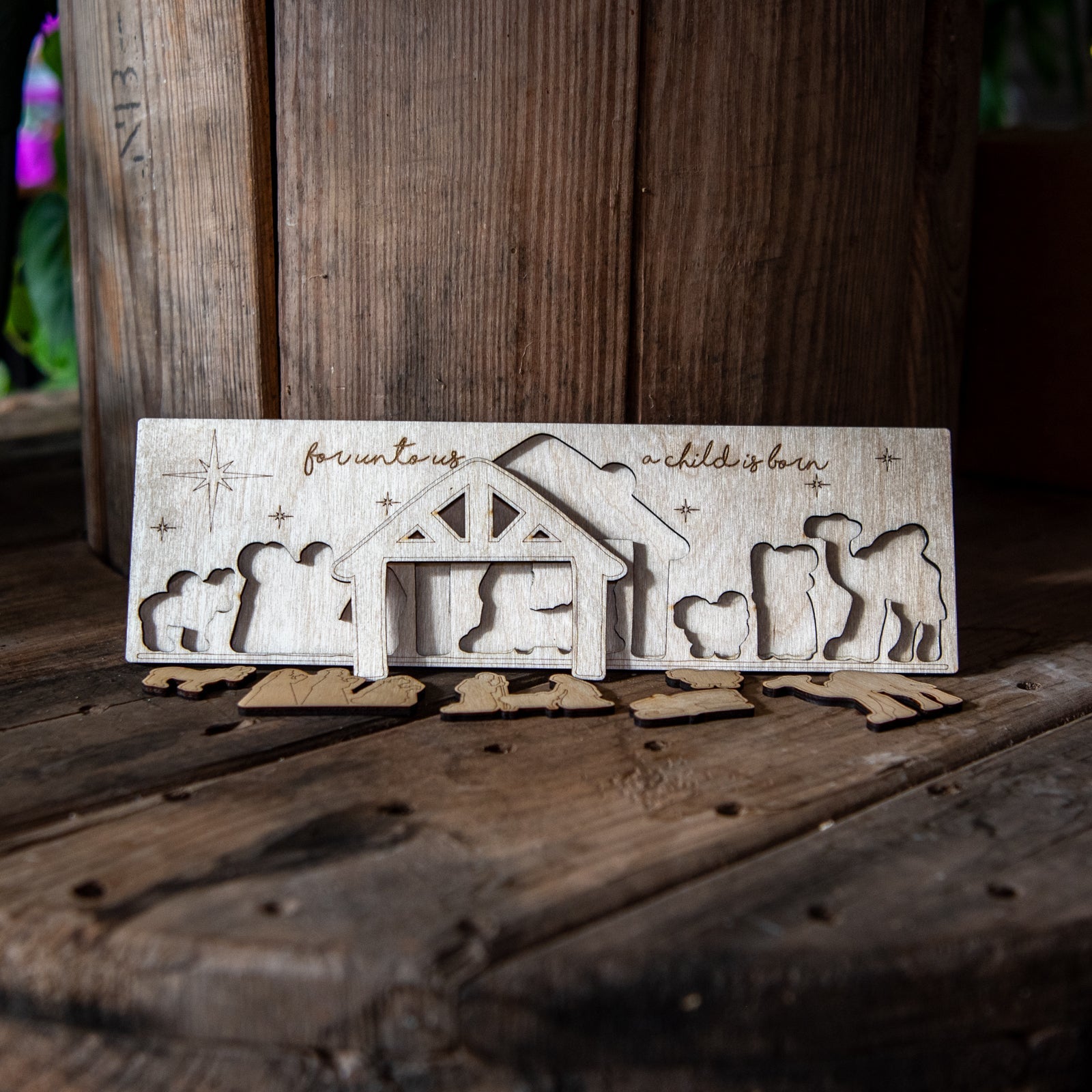 Children's Nativity wood puzzle by Still Magnolia featuring colorful, interlocking wooden pieces for festive holiday activity.