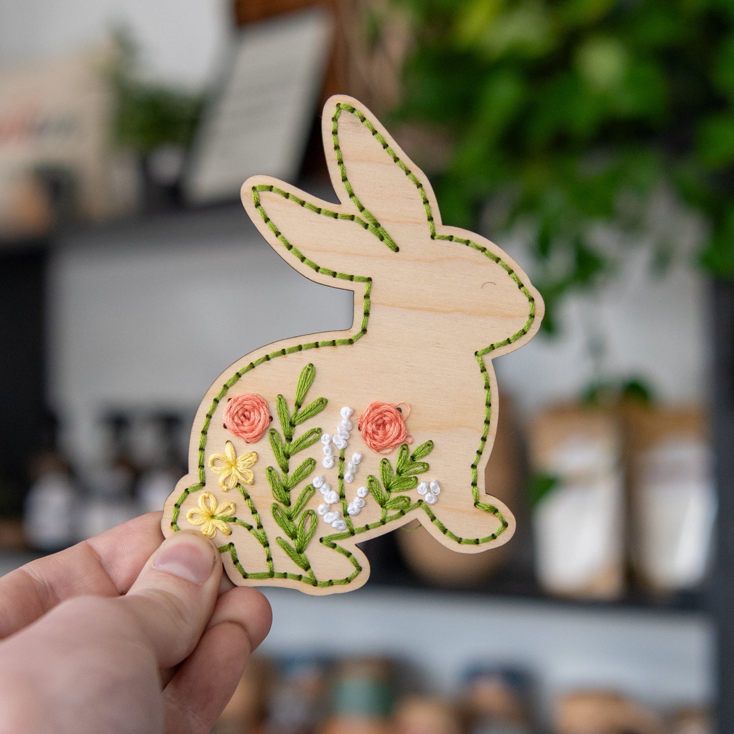 Spring Bunny Embroidery Kit by Still Magnolia featuring colorful bunny design and embroidery supplies for crafting.