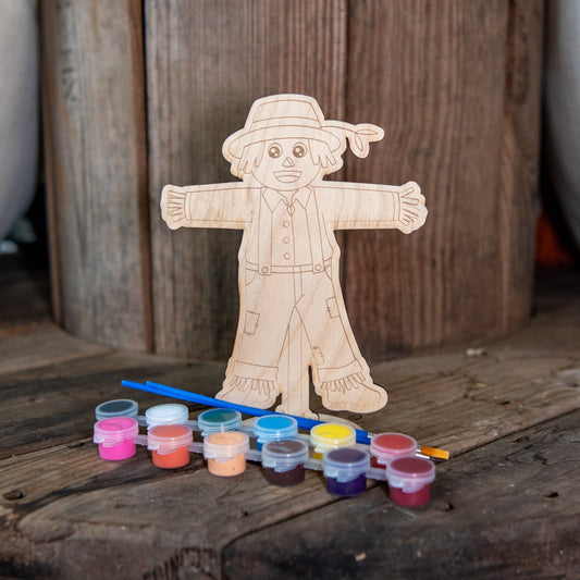 Kids painting kit featuring a fall scarecrow design from Still Magnolia, includes supplies for creating seasonal artwork.