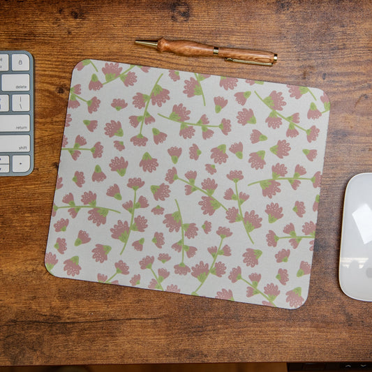 Still Magnolia purple floral mouse pad featuring vibrant floral design, ideal for comfortable computer use.