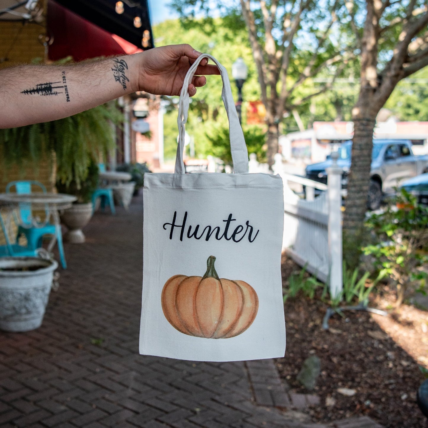 Personalized Trick-or-Treat Bag by Still Magnolia featuring a festive pumpkin design and space for custom text.