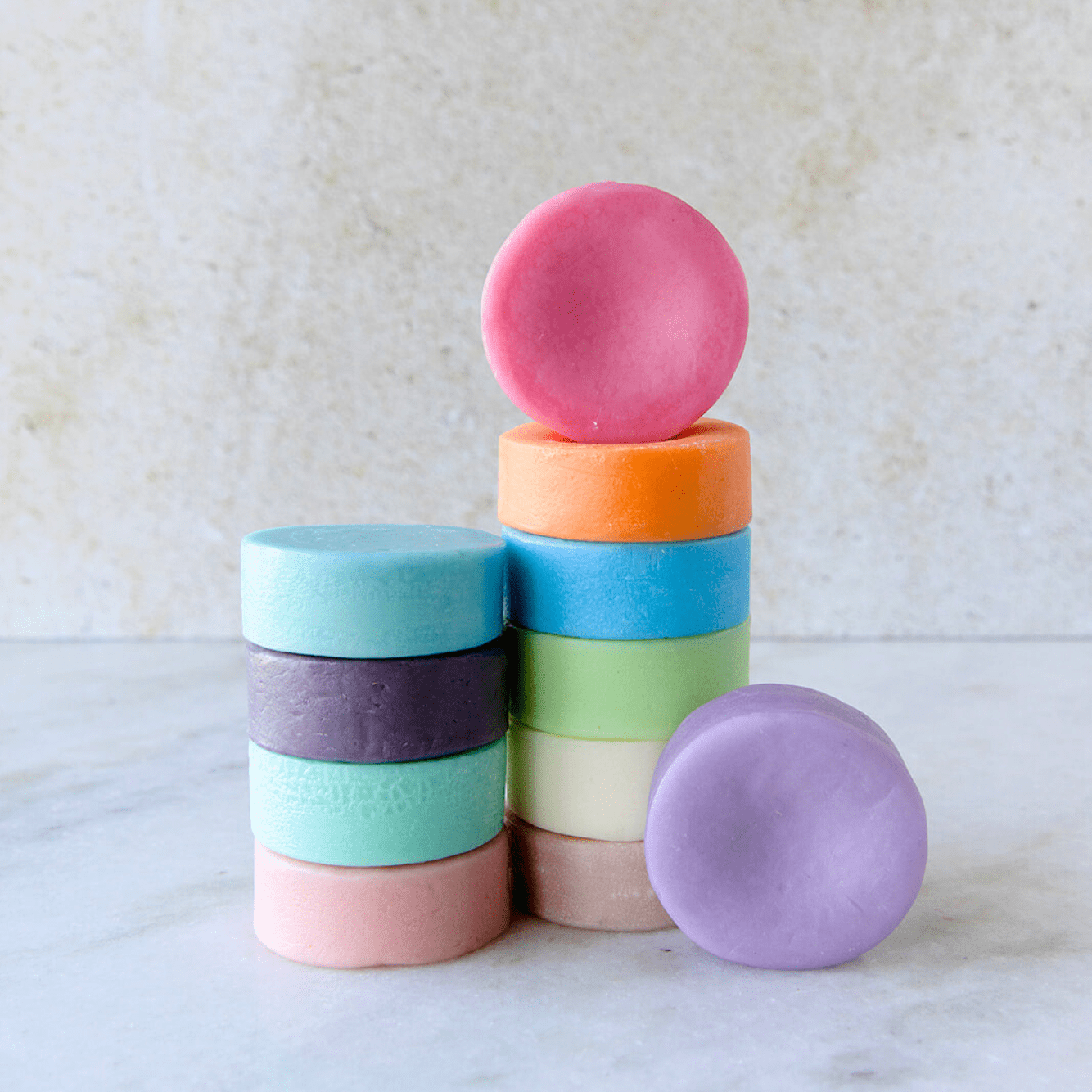 Eco-friendly ZeroWasteStore conditioner bar with suds, showing its natural, solid form and packaging for sustainable hair care.