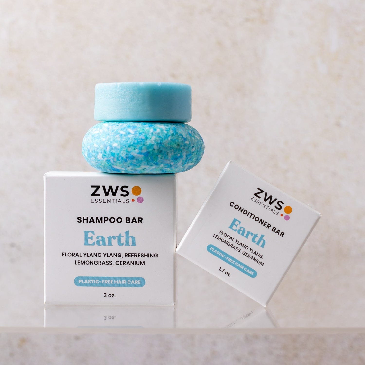 Eco-friendly shampoo and conditioner bar duo from ZeroWasteStore.com, shown with soap bars and natural packaging.