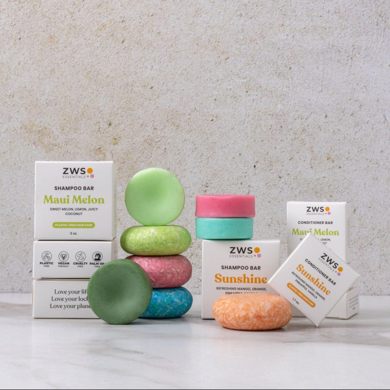 Eco-friendly shampoo and conditioner bar duo from ZeroWasteStore.com, with natural soap suds and sleek packaging.