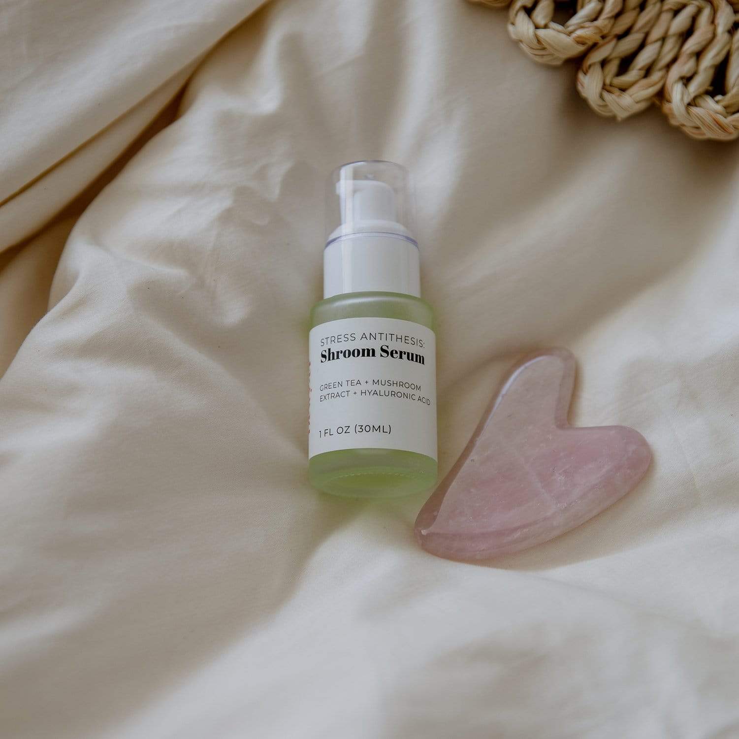 Rose quartz Gua Sha facial tool for skin care, handmade, plastic-free, designed to promote facial massage and skin health.