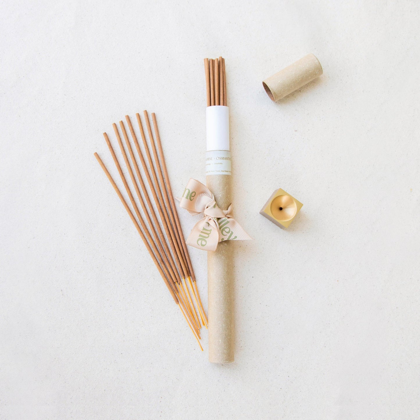 Set of Tilley + Me essential oil incense sticks for aromatherapy with matching accessories, displayed in a flat layout.