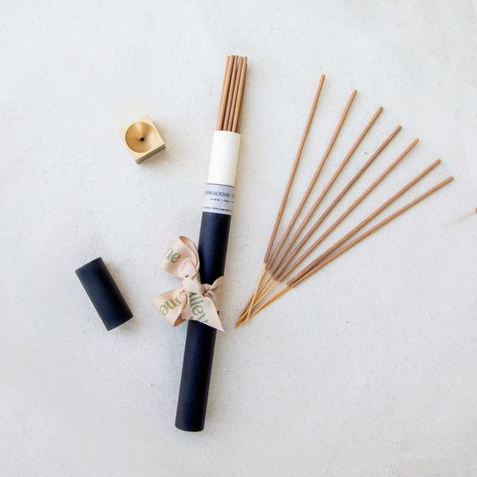 Tilley + Me essential oil incense sticks for aromatherapy with matching accessories, displayed in a flat-lay arrangement.