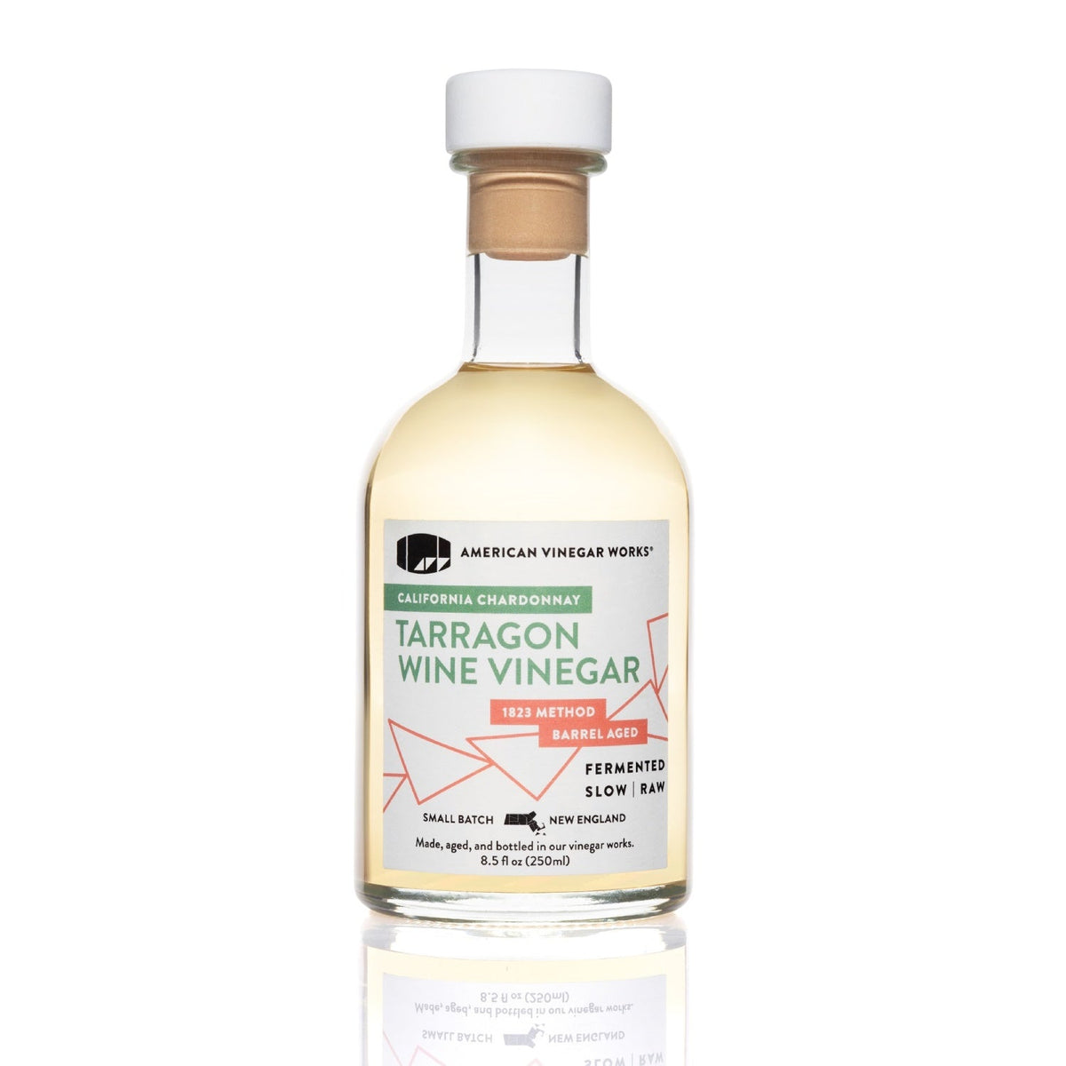 250ml bottle of American Vinegar Works tarragon wine vinegar with a clear label and dark glass bottle on a white background.