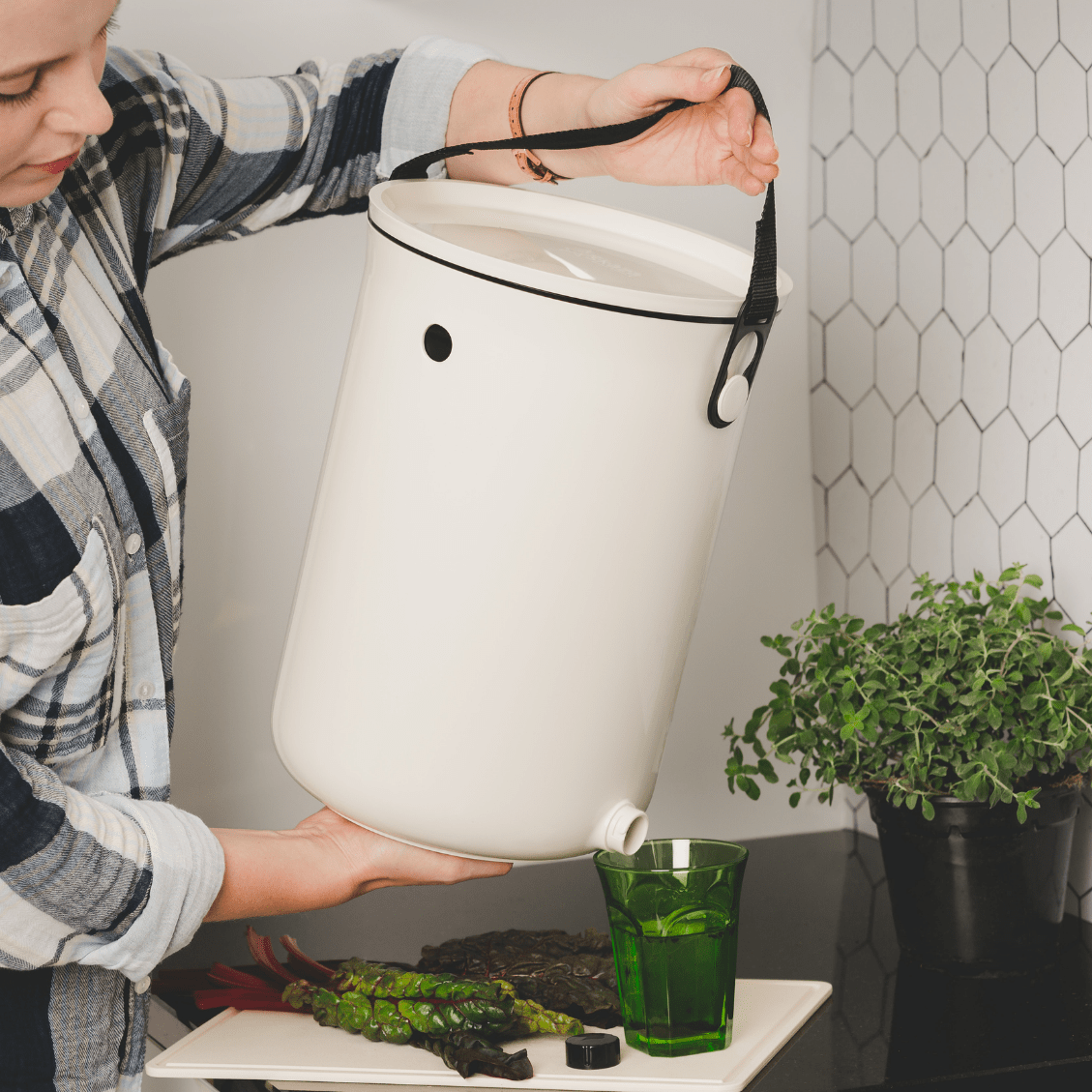 Teraganix Bokashi Kitchen Compost Bin, 2.5-gallon size, with a 1-lb bag of Olive Bokashi for composting at home.
