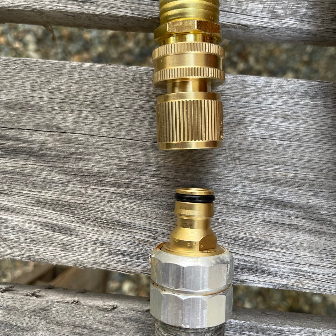 Brass hose organization bundle with connectors from The Celtic Farm, designed to neatly organize and connect garden hoses.