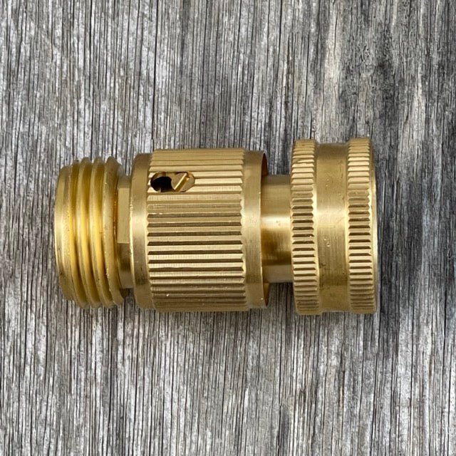 Brass garden hose quick connect connector by The Celtic Farm, durable and easy-to-use for garden watering systems.
