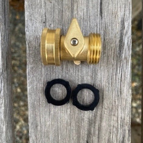 Brass shutoff valve for garden hoses with brass connectors, manufactured by The Celtic Farm, installed on a garden hose.