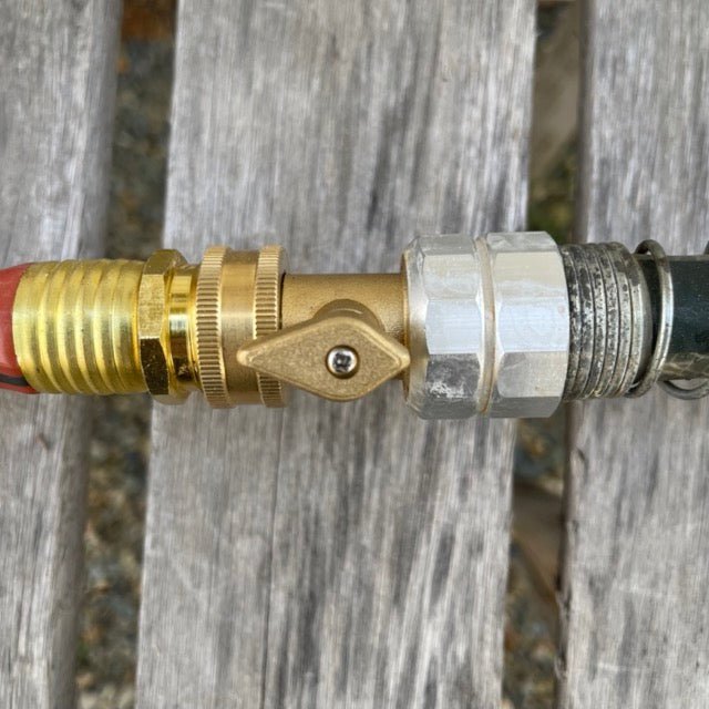 Garden hose brass shutoff valve with brass connectors from The Celtic Farm, designed for controlling water flow.