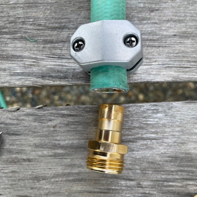 Brass connectors for garden water hose repair kit by The Celtic Farm, showing close-up of durable hose repair connectors.