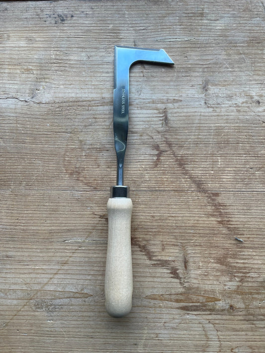 The Celtic Farm garden gift box with a burlap bag containing a unique garden tool set for gardening enthusiasts.