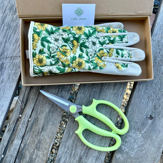 Garden Gift Box from The Celtic Farm with green and yellow gardening gloves and herb snips for gardening enthusiasts.