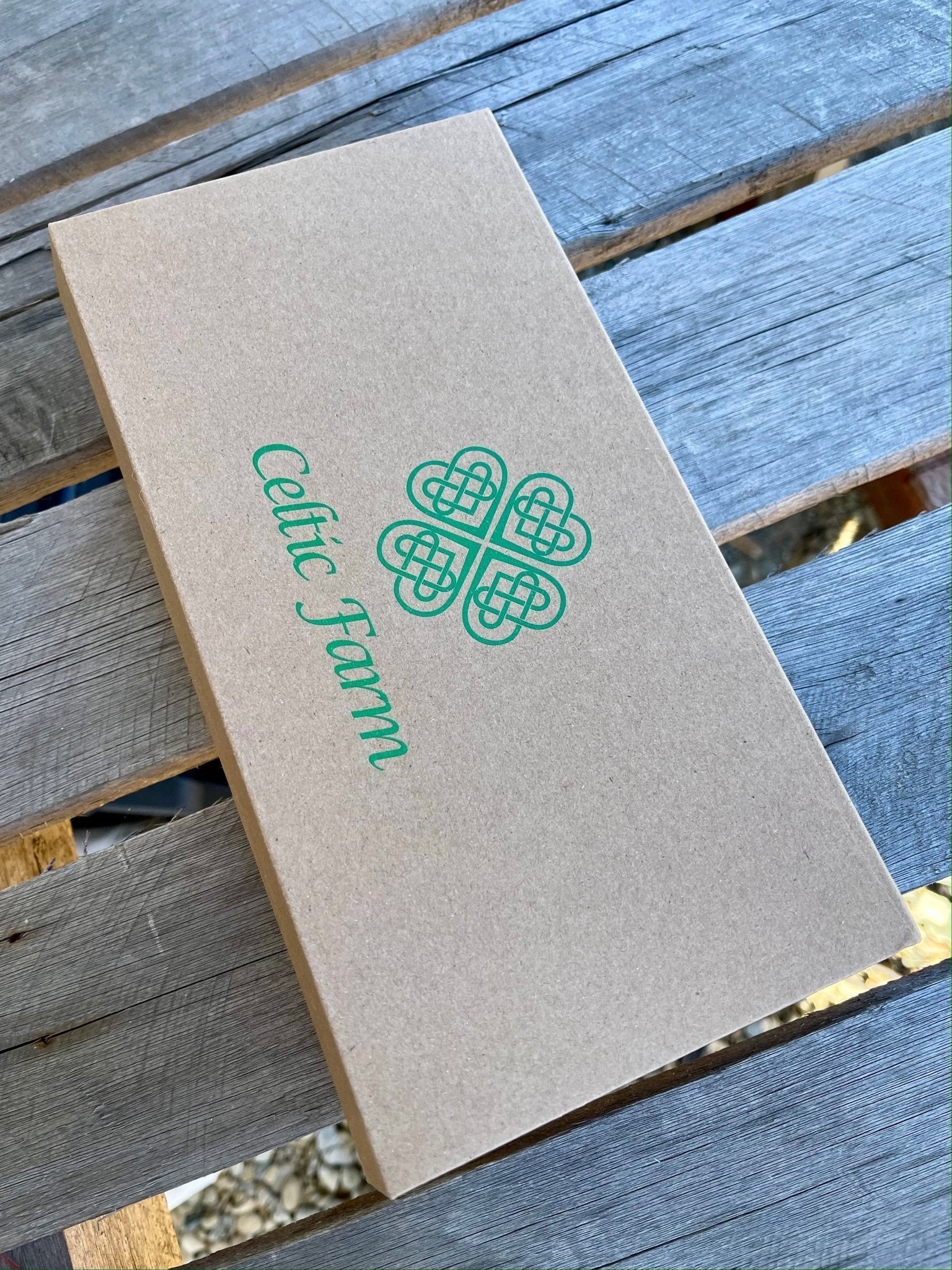 Garden Gift Box from The Celtic Farm with green and yellow gardening gloves and needle snips for gardening tasks.