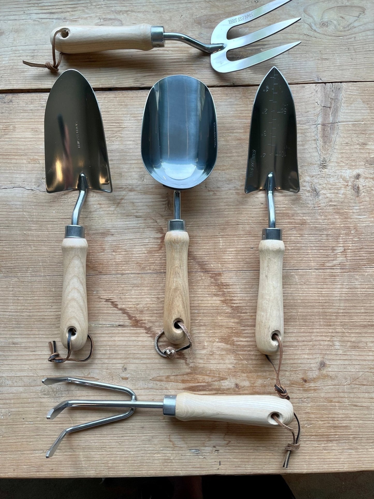 Garden Master Tool Set by The Celtic Farm in a burlap gift box, includes five gardening tools for planting and gardening tasks.