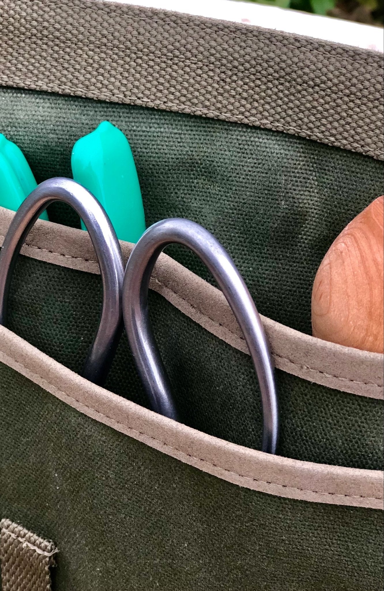Waxed canvas garden tool belt by The Celtic Farm, adjustable gardening belt with multiple pouches in hunter green.