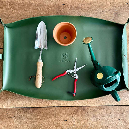 Waterproof potting mat from The Celtic Farm, ideal for tidy gardening and protecting surfaces during planting and repotting.