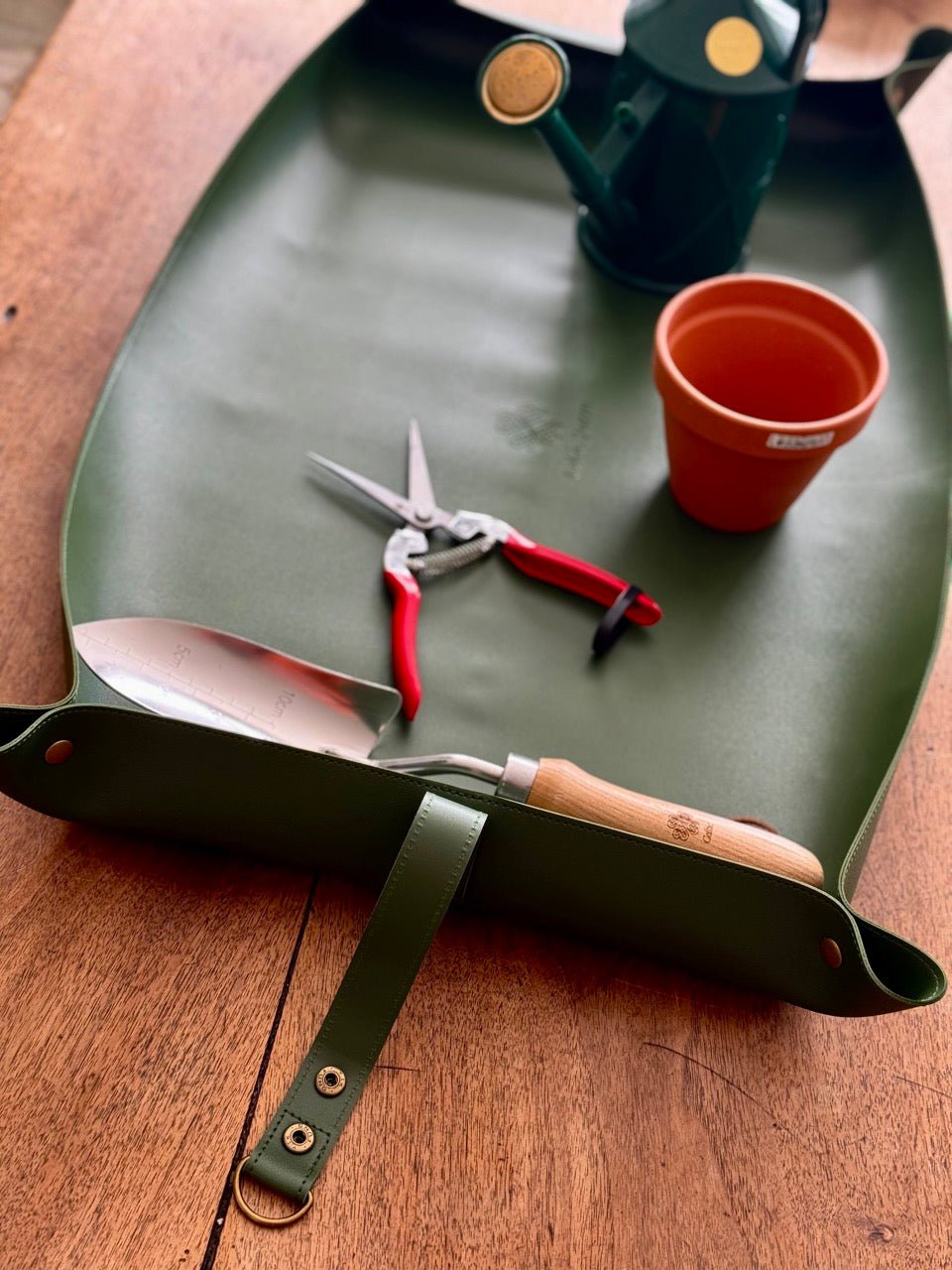 Waterproof potting mat by The Celtic Farm, ideal for tidy gardening and protecting surfaces during planting and potting tasks.