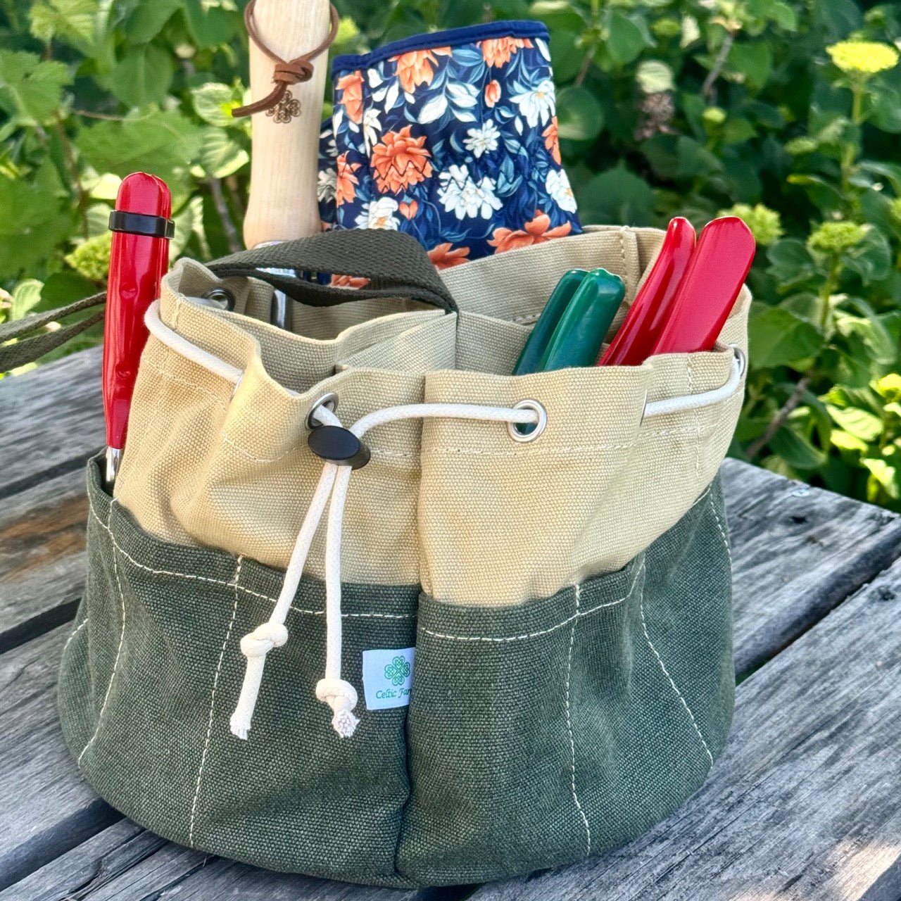 Heavy waxed canvas garden bucket bag from The Celtic Farm, durable gardening tote with sturdy handles and spacious interior.