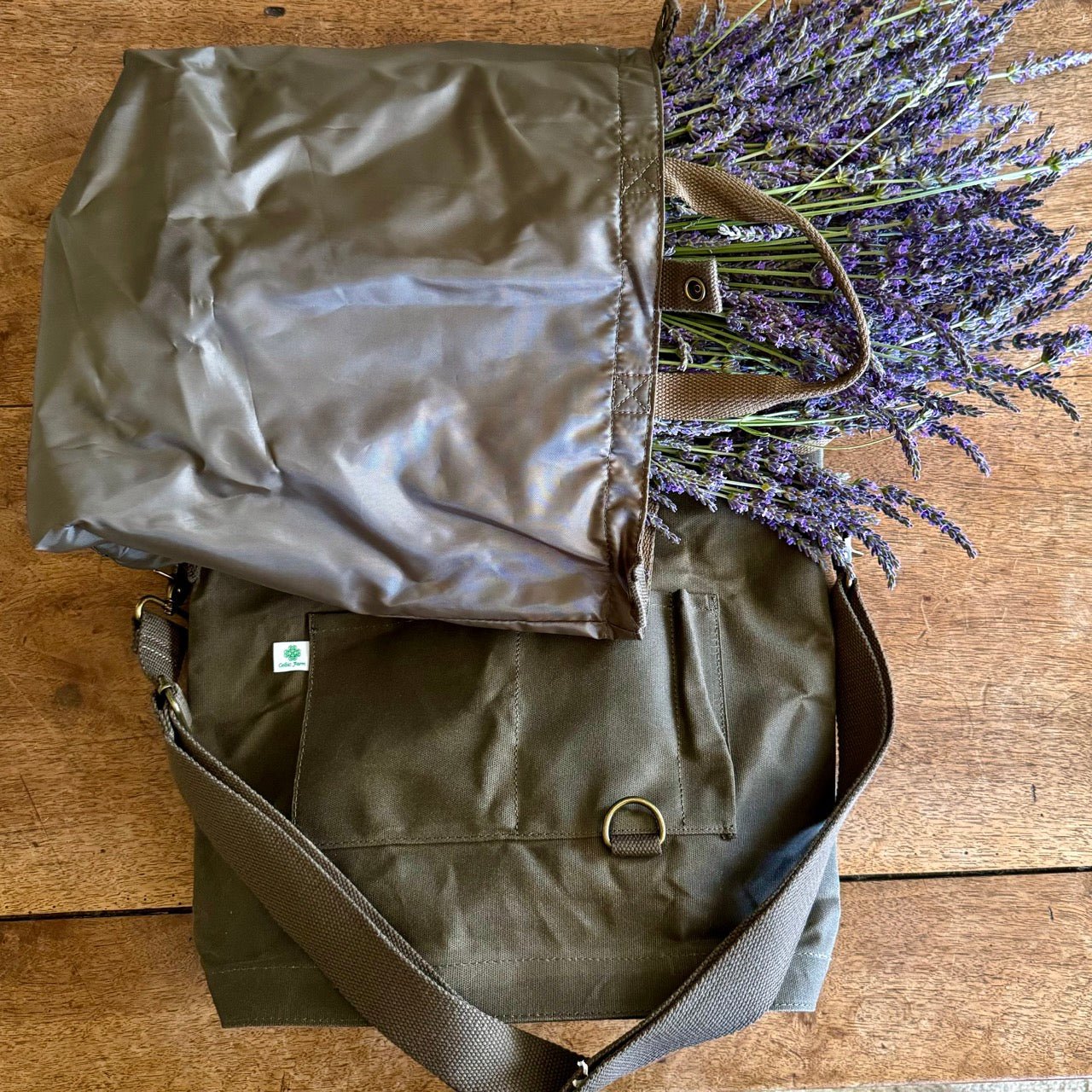 Gardener's Multipurpose Shoulder Bag by The Celtic Farm for tools, market visits, or harvest, shown in a natural outdoor setting.