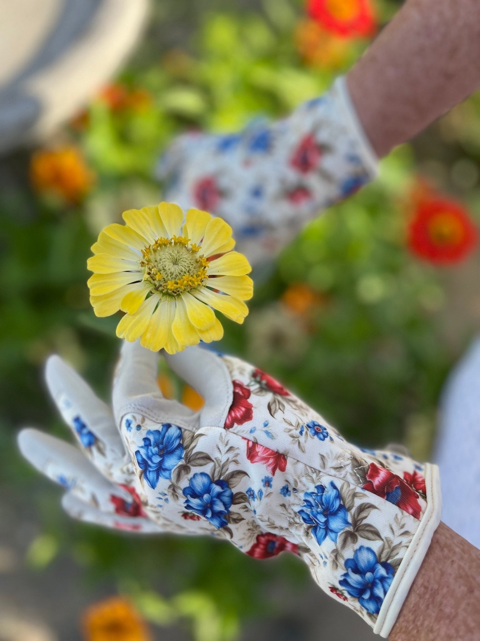 Women's floral gardening and project gloves by The Celtic Farm, featuring colorful flower design and durable fabric for gardening tasks.