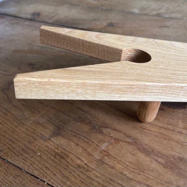 White oak English boot jack by The Celtic Farm, a sturdy home shoe accessory for easy boot removal.