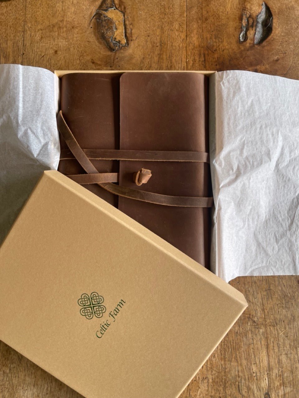 Leather garden journal and diary by The Celtic Farm with pages for garden thoughts, planning, and design.