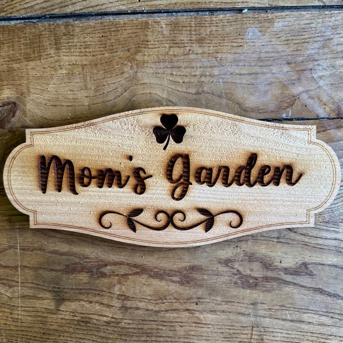 Mom's Garden Sign with Shamrock by The Celtic Farm, made in USA from American cedar, featuring a decorative shamrock design.